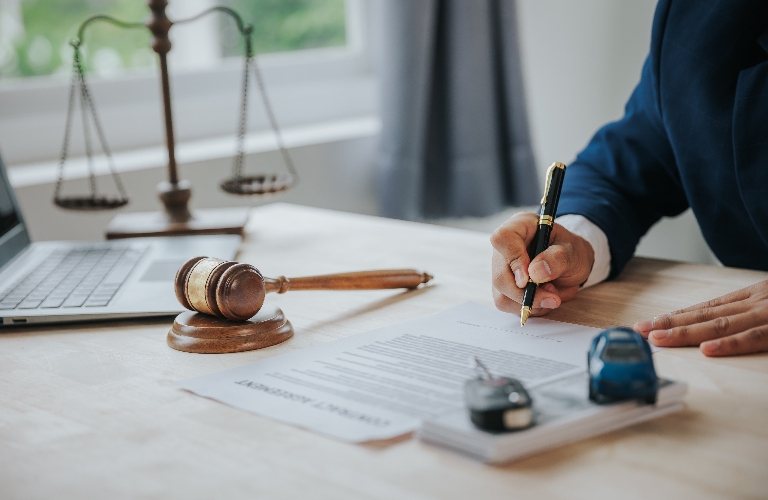 Judge male hand with car and documents