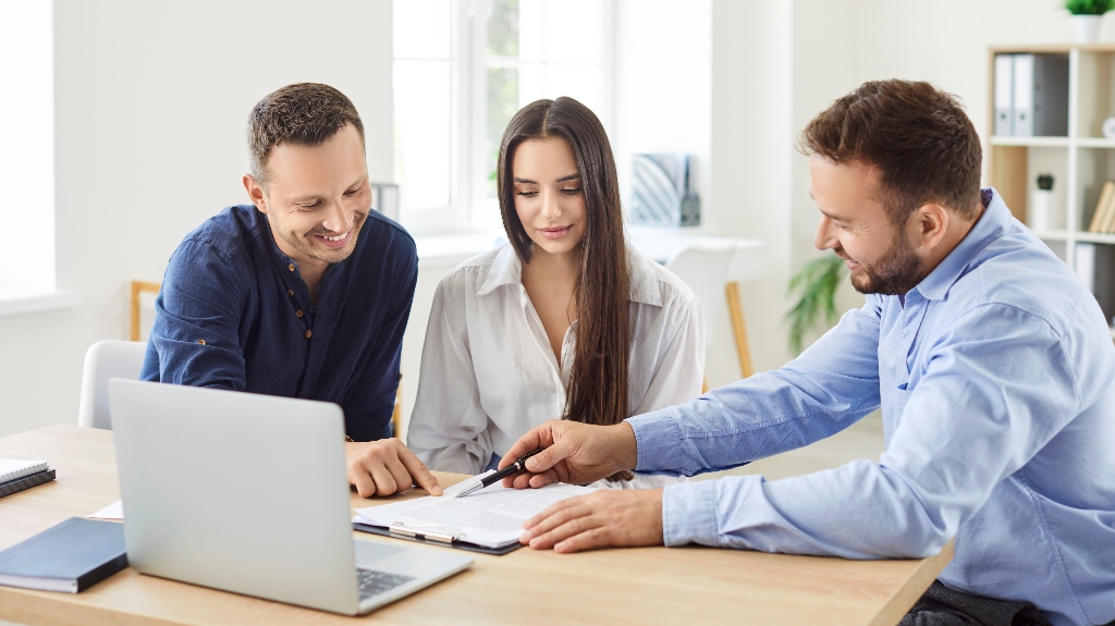 Young couple is consulting with estate planning lawyer